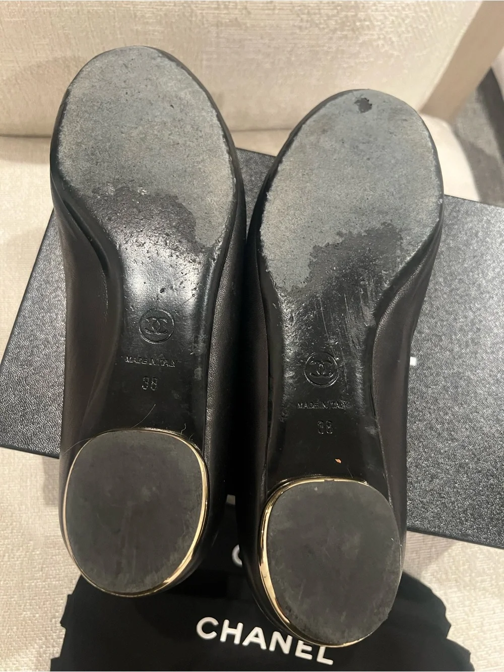 CHANEL Black Leather Camellia Round-Toe Flats